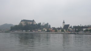 Grein with its elevated palace in a misty morning